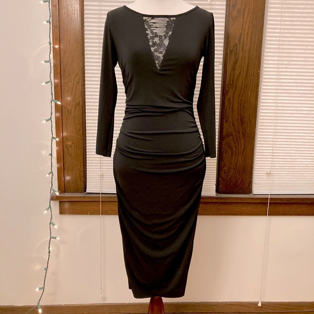 Sophisticated black bodycon dress by Graham and Spencer